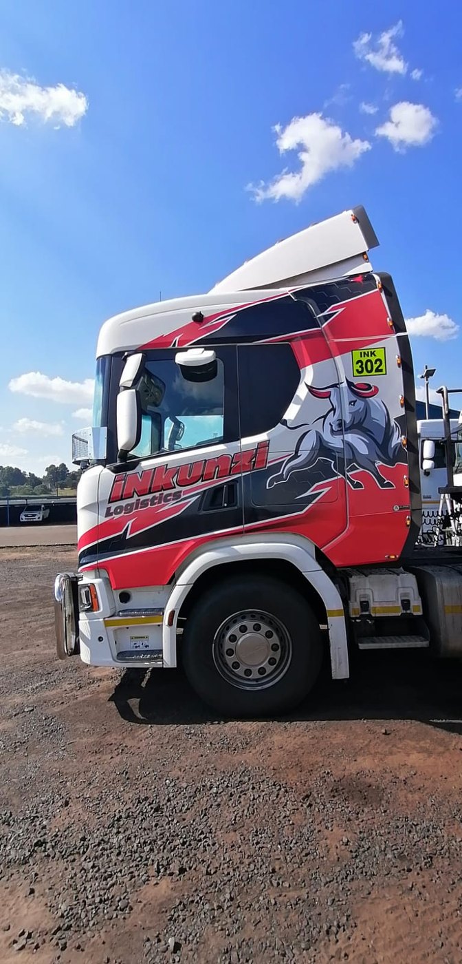 Scania truck cab colour wrap and charging bull livery for iNkunzi Logistics
